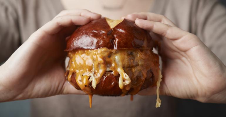 Burger Specialists Embrace Dry-Aged Beef for Enhanced Flavor and Faster Cook Times